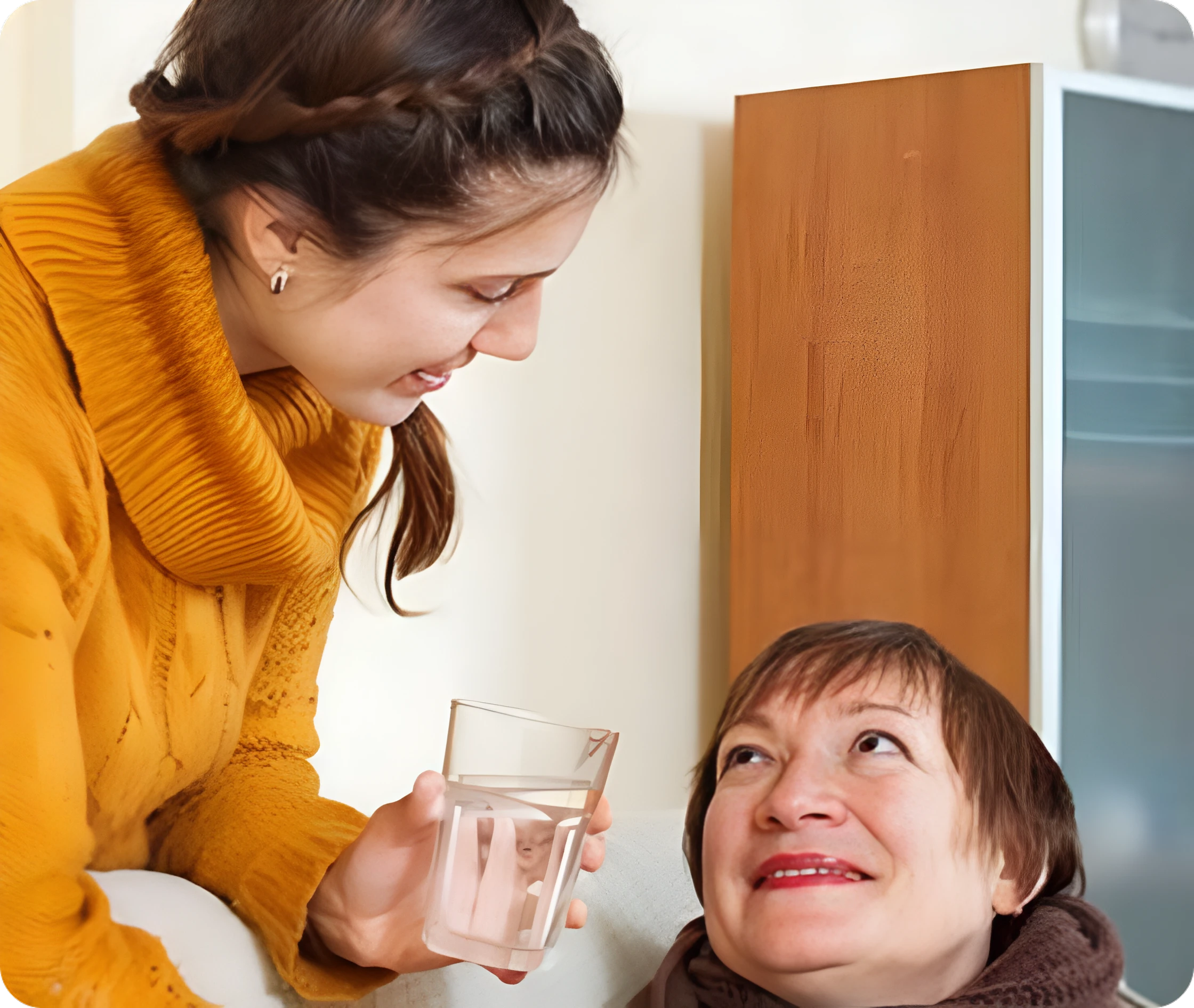 Two women sharing a caring moment.